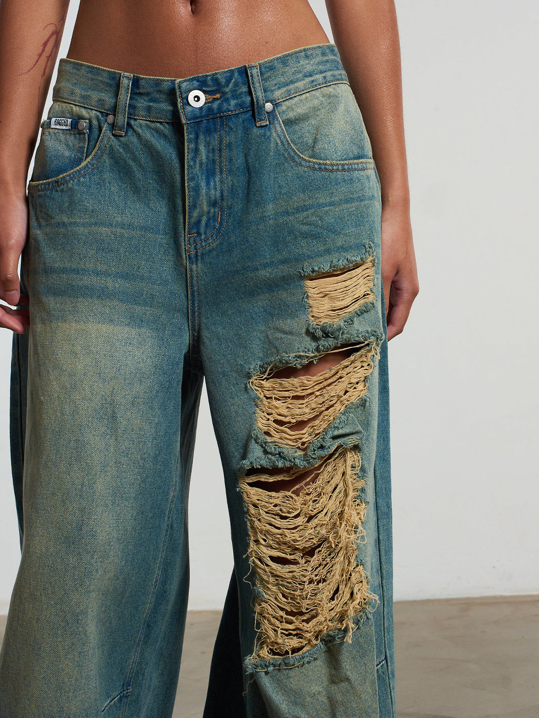 DISTRESSED GOLIATH JEANS
