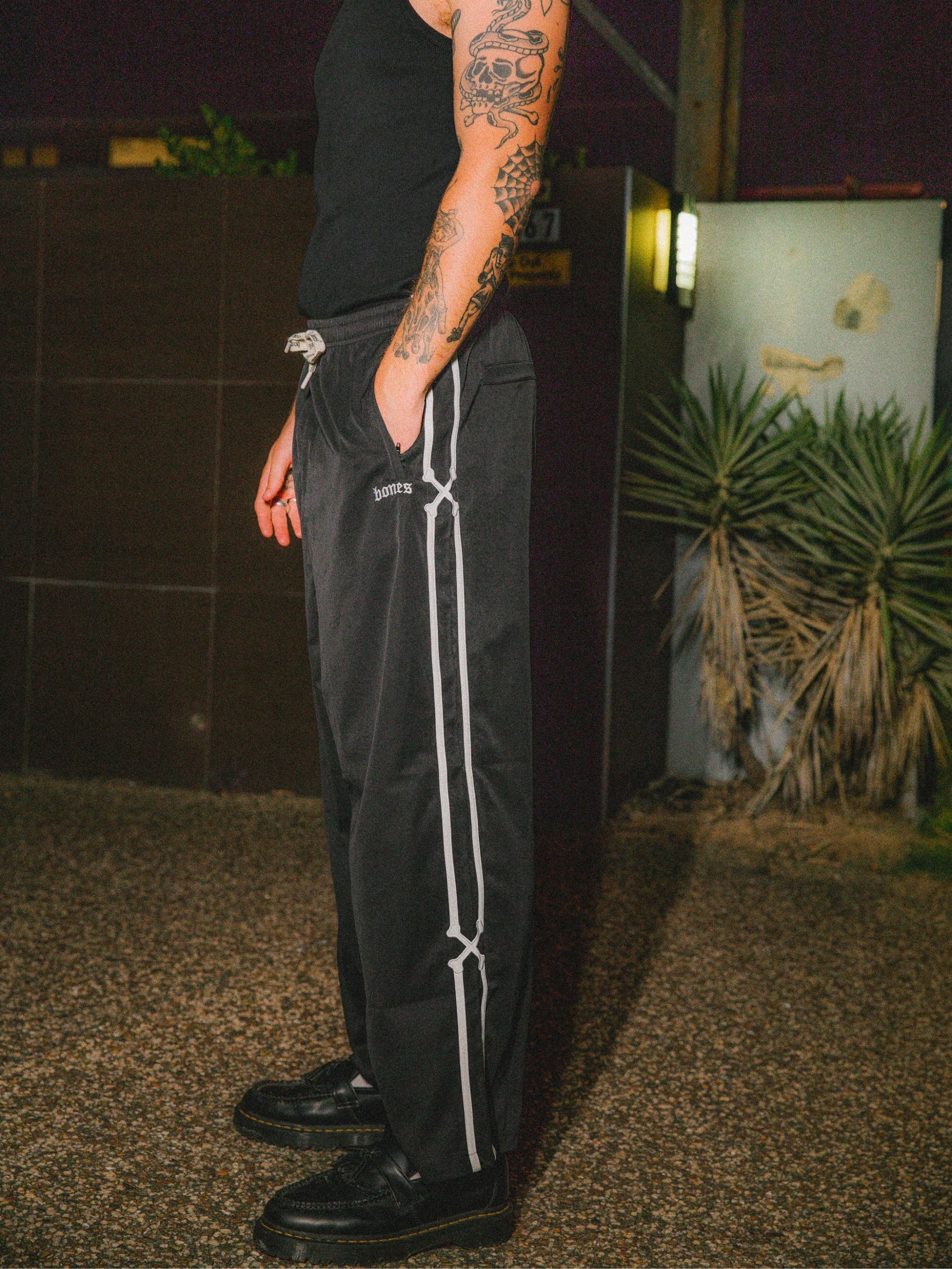 DOUBLE CROSSED TRACK PANTS - BLACK