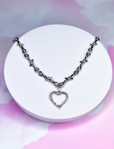 HEART IN A CAGE CHAIN NECKLACE